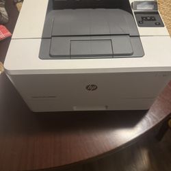 HP 402 B/W Printer. 