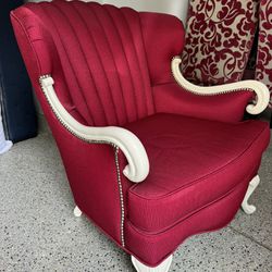 Elegant Red Channel-Tufted Armchair with White Trim and Nailhead Detail