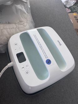 Cricut Easy Press and Box of Vinyl