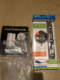 Brand new sealed pure shower with FREE soap and shampoo wall dispenser sealed included