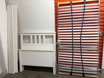 Title: Ikea Twin Wood Bed 