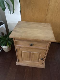 Sturdy wooden side table with drawer