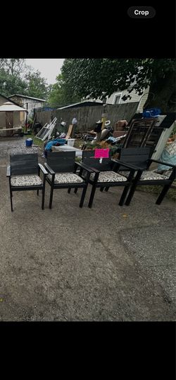 4 wooden heavy thick black chairs