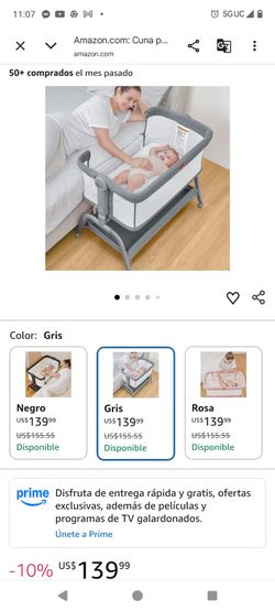 Bedside crib bassinet is color caqui and white