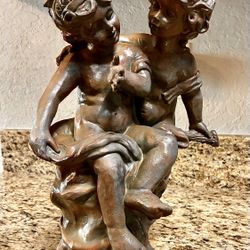 Beautiful Statue Of “boy and a girl “ by “Three Hands Corporation”    