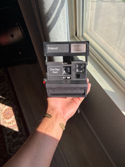Polaroid One step flash 600 Camera
