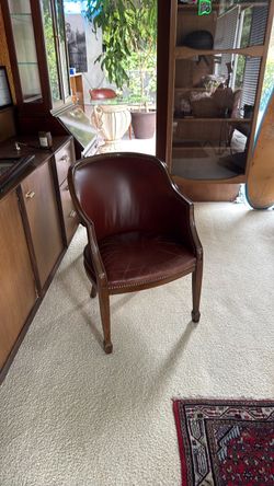 Two leather doctor office chairs