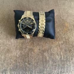 Gold And Black Watch And Bracelet 