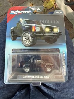 Majorette Collection 1985 Toyota Hilux SR5 Pickup Black 1:64 Scale