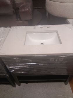 Single bathroom sink come with a cabinet with two doors brand new