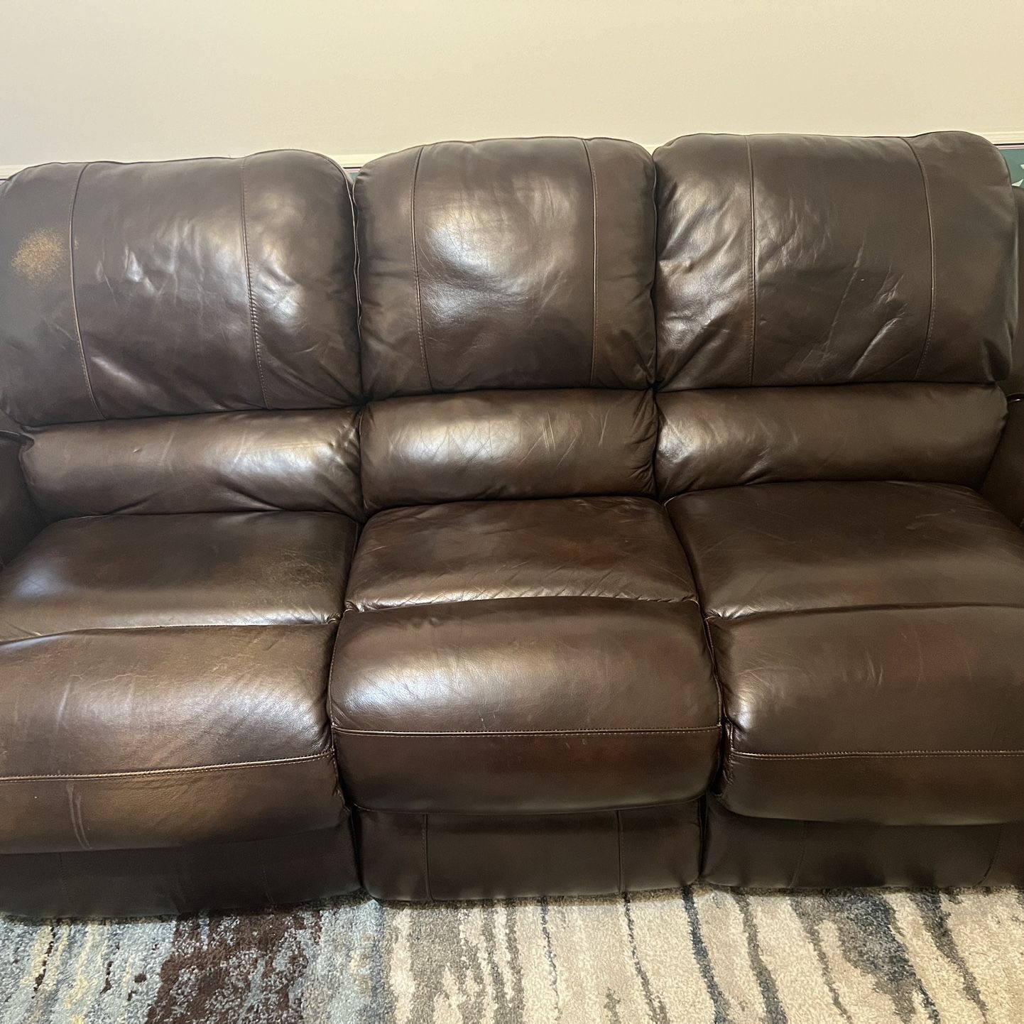 Leather sofa W/ Two Recliners