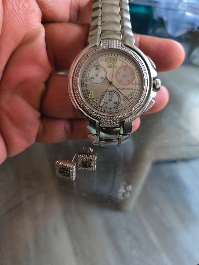 Maubussin 463 Chronograph Quartz w/Diamond Bezel, Sultan Of Oman Khanjar Edition.. Stainless Steel Bracelet w/white dial in very good condition..