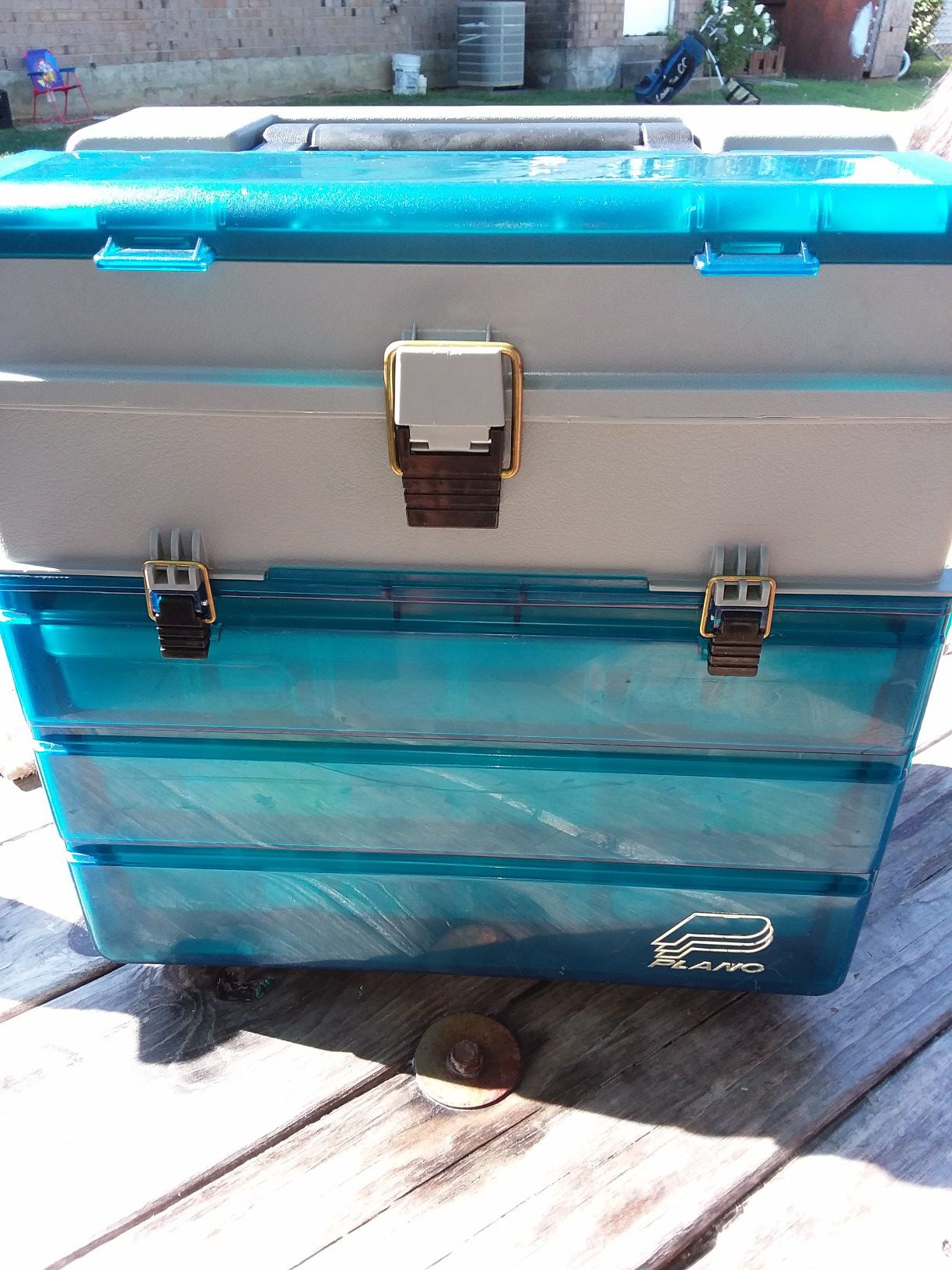 Tackle box with fishing lures hooks anchors
