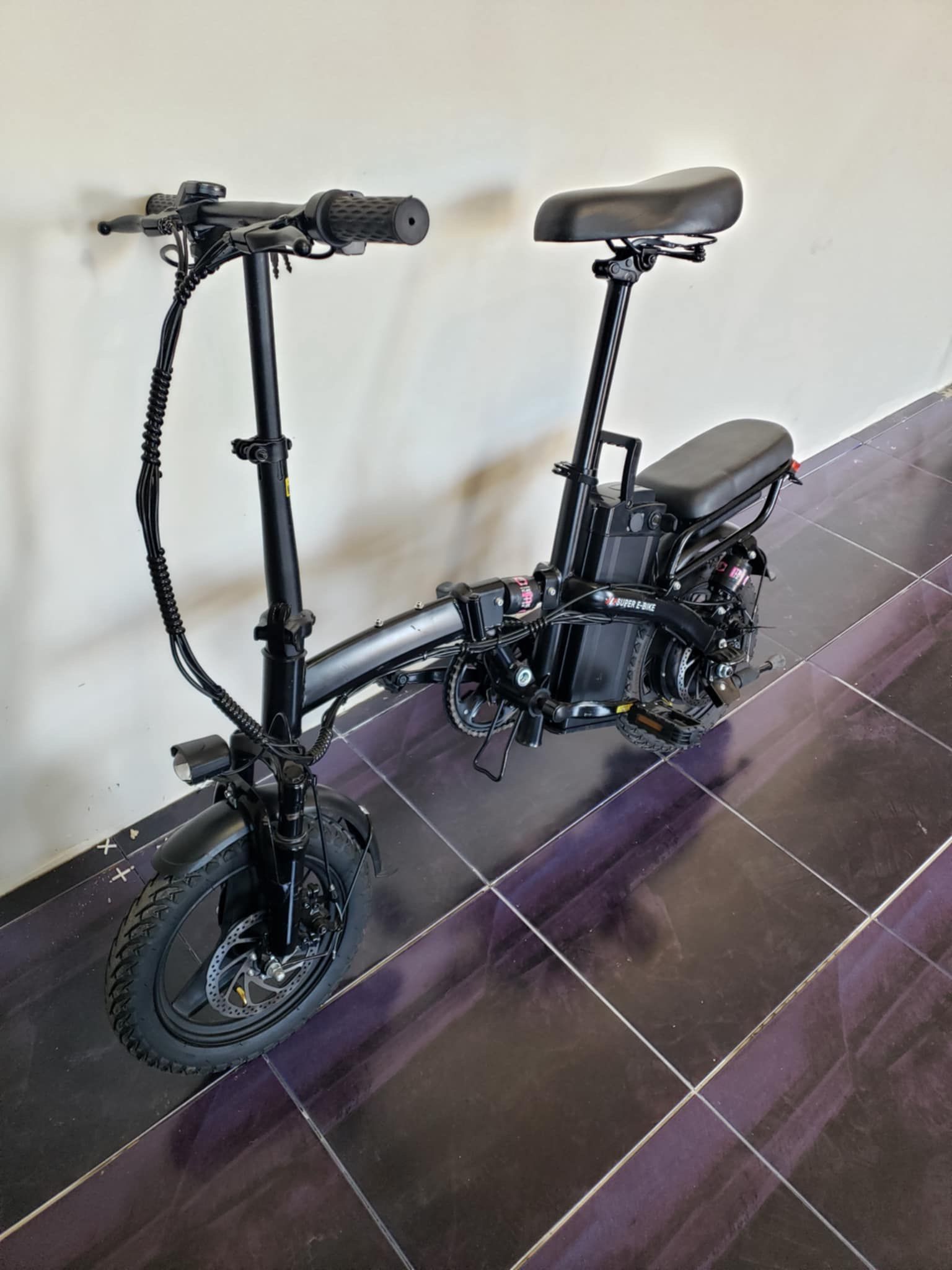 Electric Bike Ebike E-bike Folding Bike . 650lb front suspension & 450lb back suspension. Super Electric bike up to 25mph 40miles range. $500! 0050mi