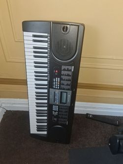 Music Keyboard/ stool and stand.