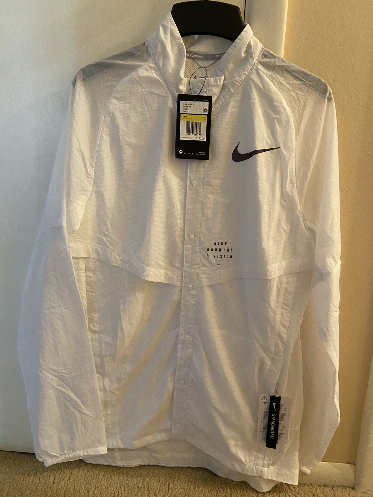 Nike Running Jacket - Men’s size Small - water Repellent