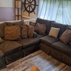 2 Couches With Pillows 