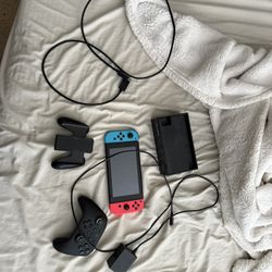 Nintendo Switch With Pro Controller And 2 Games.