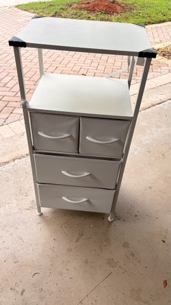Four drawer dresser with outlets