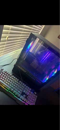 Sparrow PC with a Ryzen 5 5600G, 1TB SSD, RGB, gaming monitor, keyboard, and mouse