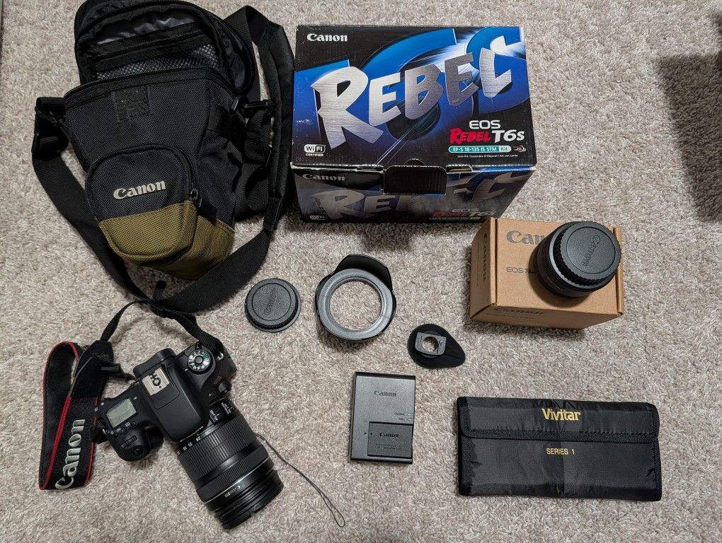 Canon T6S with 18-135mm lens, additional 50mm f/1.8 lens, Extras