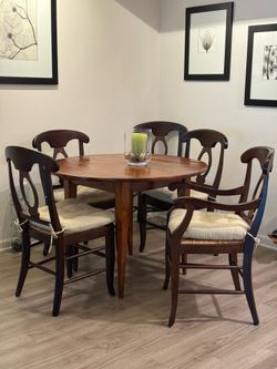 All hardwood 42inch diameter dining table and 5 chairs
