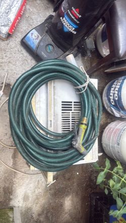 50 ft hose water w/ sprayer good condition!
