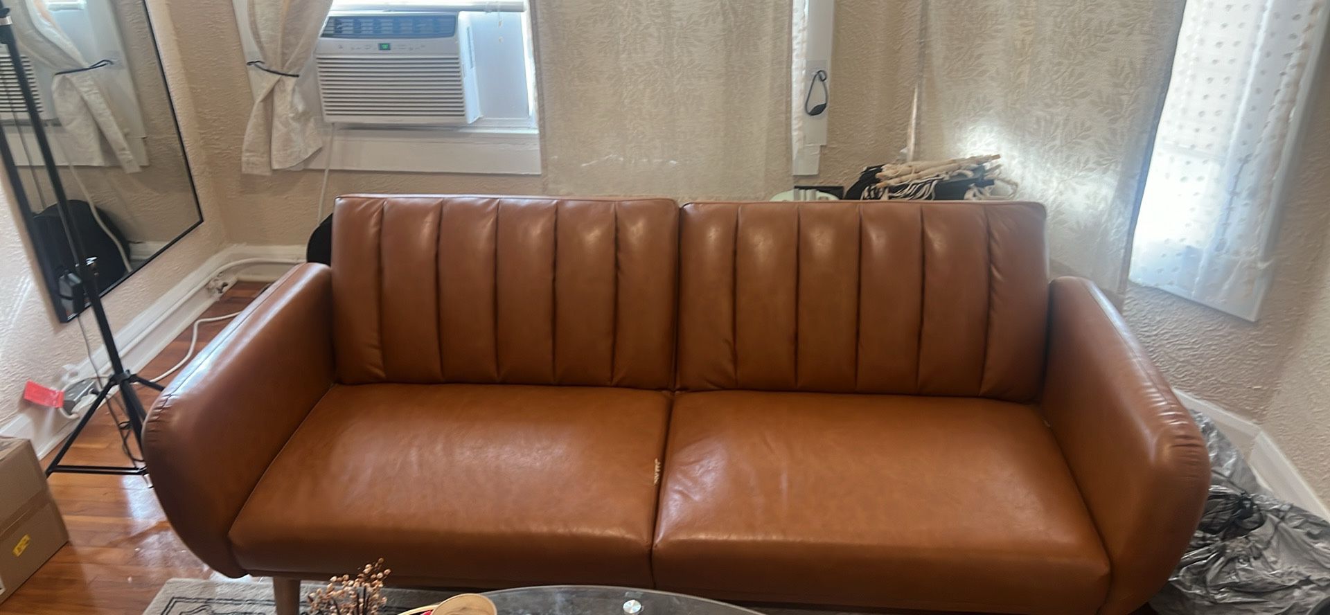 Brown leather futon couch