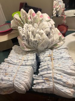 Large Lot of Mixed Baby Diapers size 1