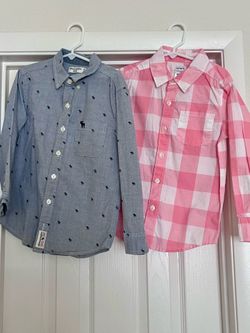 Boys shirts size 5 /6 and 5 $ 15 one new and one used perfect conditions