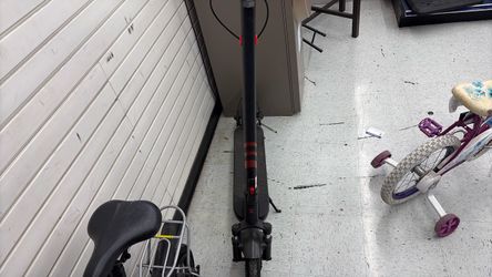 Black Electric Kick Scooter with Red Accents