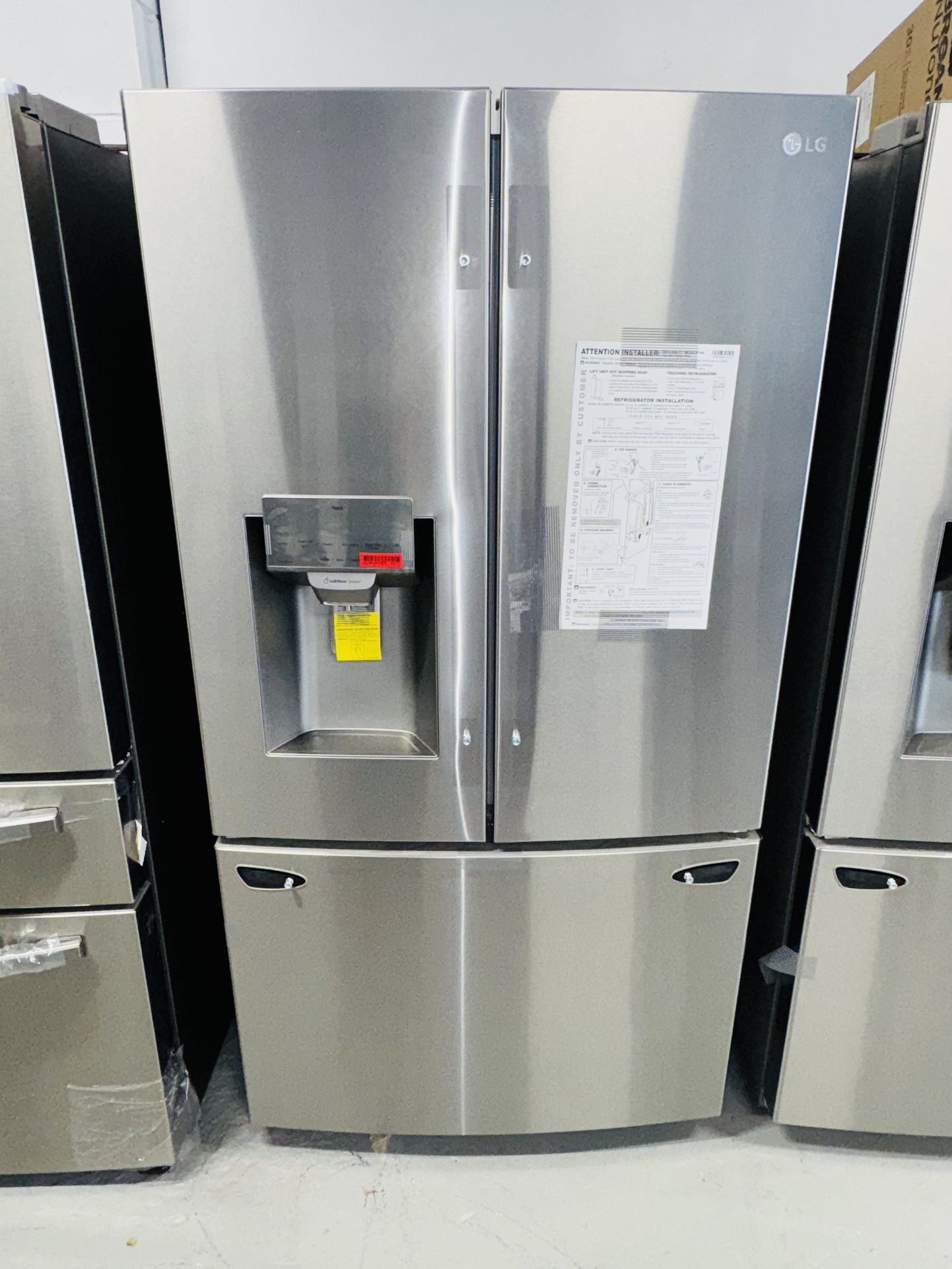 New LG French-door refrigerator, 36 inches wide, 69 inches high, and 29 inches deep. Financing is also available.