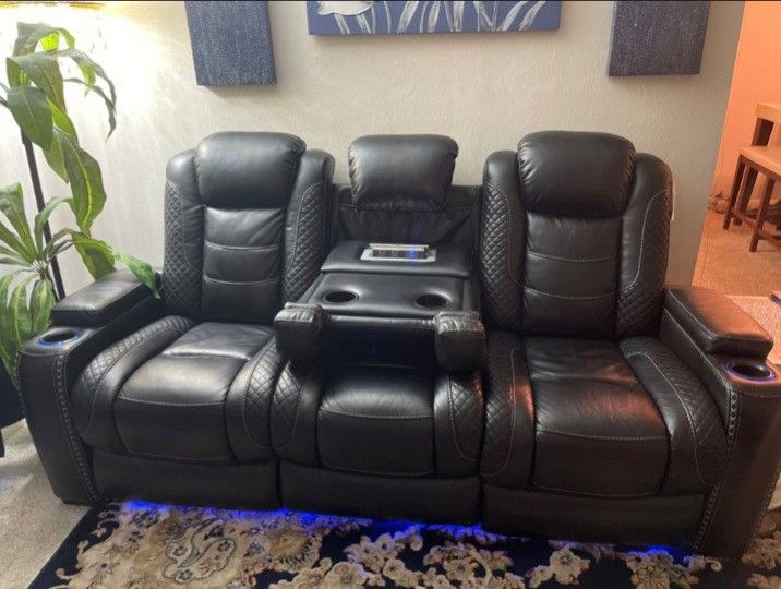 Faux Leather Sofa And Loveseat By Ashley Furniture