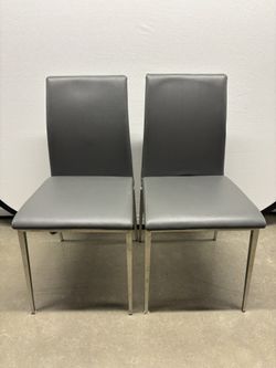 Pair Of Moe’s Home Collection Leather Dining Chairs