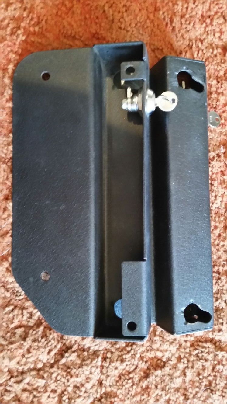 1 set of Saddlebag mounting brackets. Ghost or edge brackets with keys, no other hardware. 10 3/8 center to center.