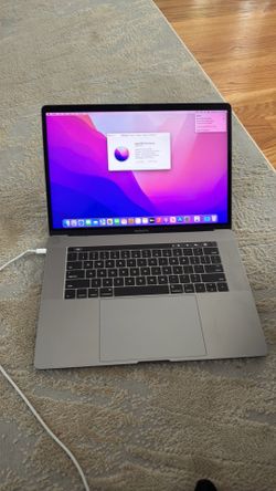 MacBook Pro 15” Touch Bar 2.7ghz i7 16gb ram 500gb ssd