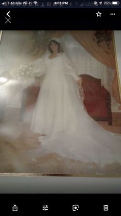 Wedding gown. Poof skirt, money bag, garter, hankie, nightgown with matching robe.