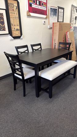 Dining table with 4 chairs and a bench
