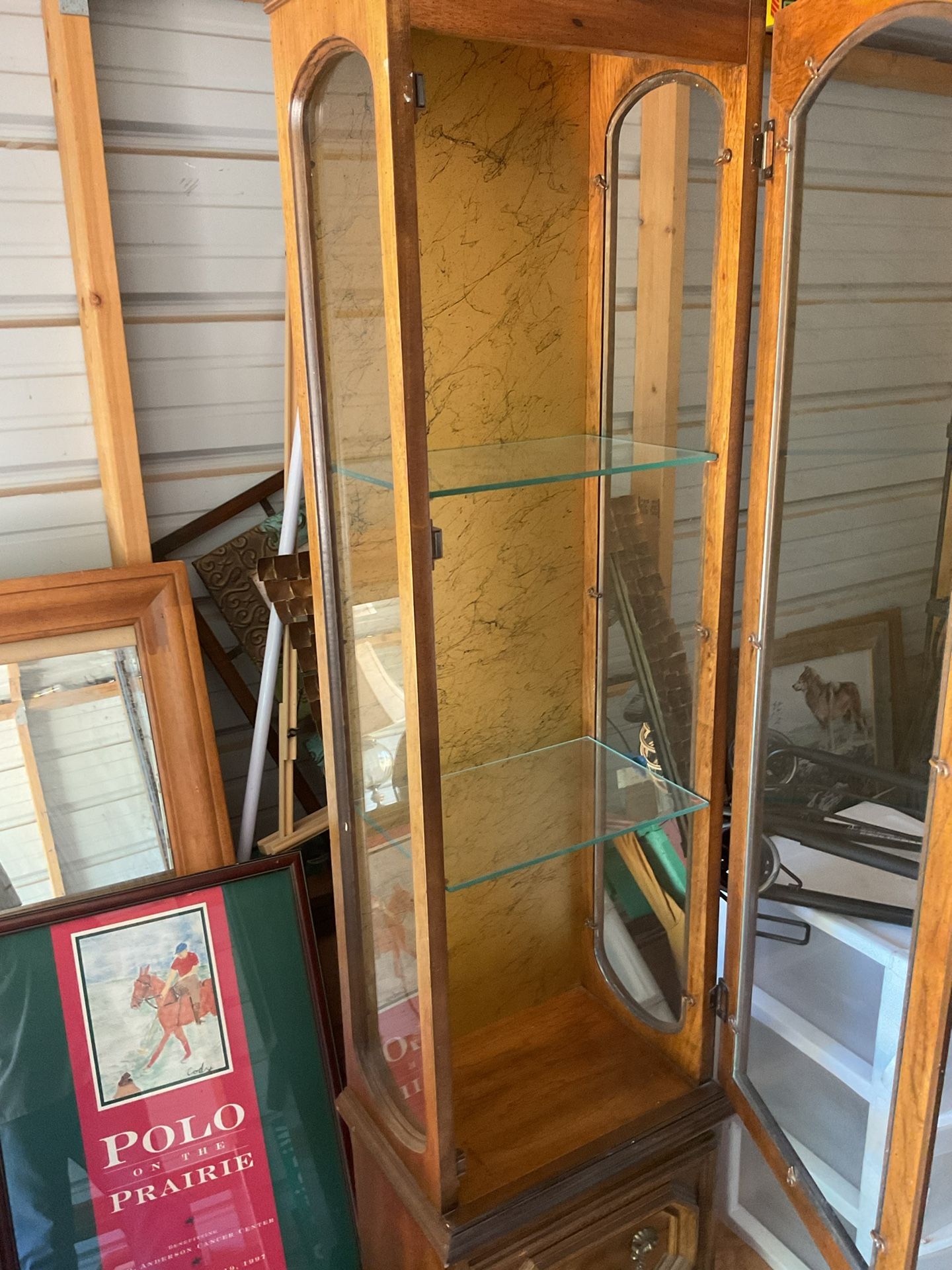 Lighted cabinet it’s 66 inches 10 inches deep 15 inches