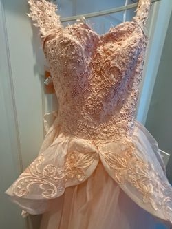 Light Pink/Peach Quinceañera Gown with hoop skirt