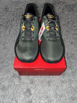 Size 9.5, men’s brand new unworn Reebok shoes with tags and box. 