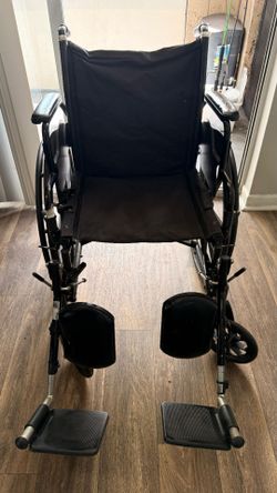 Black Folding Wheelchair with Footrests