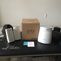 Netgear Orbi mesh WiFi network router and satellite system  $75