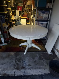 White pedestal table