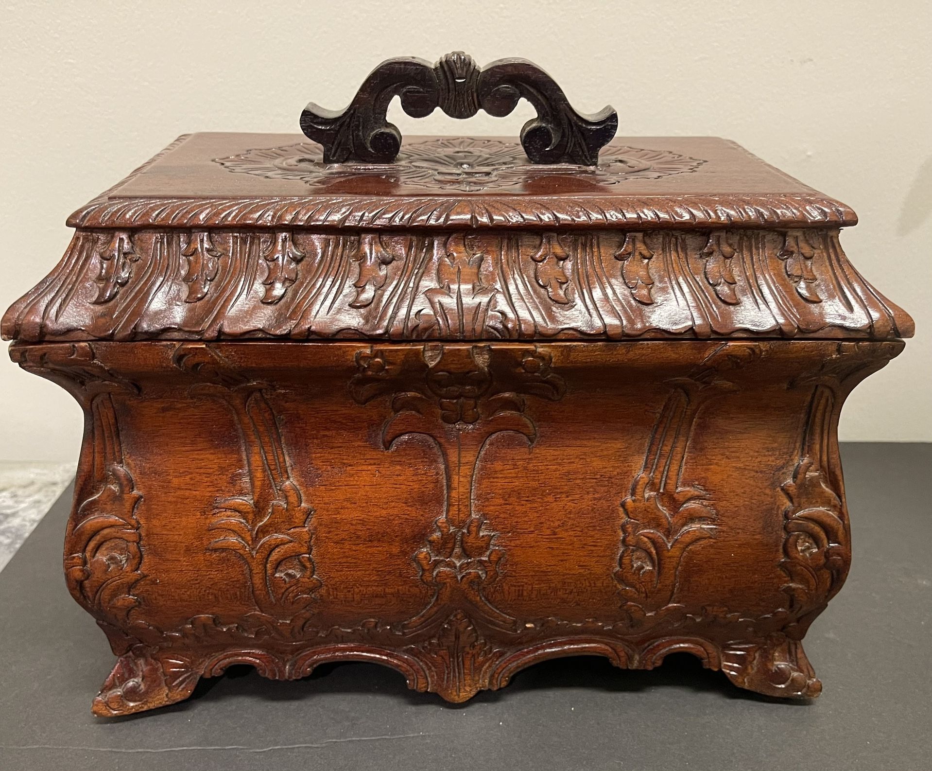 Ornate wood carved decorative box with metal finish. EUC