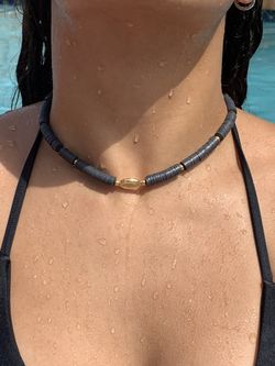 Black clay beaded choker with stainless steel gold shell