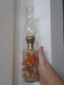 Antique oil lamp glass with butterflies