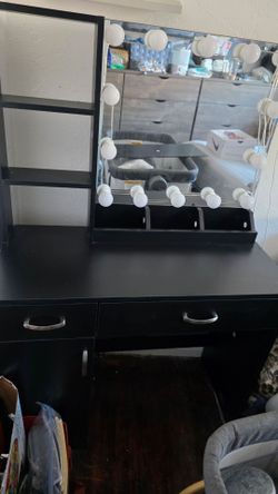 Black vanity with lights