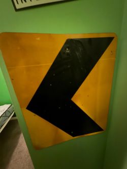 Yellow and Black Chevron Road Sign