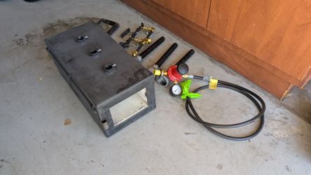 Two propane forges with regulators